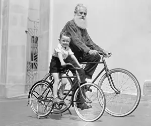 Inglewood Prints: Man and Young Boy Riding Bicycles