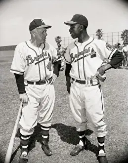 Hank Aaron Prints: Manager Charlie Grimm Talking to Hank Aaron