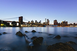 Brooklyn Bridge Gallery: Manhattan skyline at dusk seen from Brooklyn, New York City, USA
