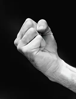 Man's hand making fist