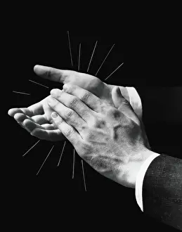 Noise Prints: Man's hands clapping, lines refracting outwards, representing sound waves