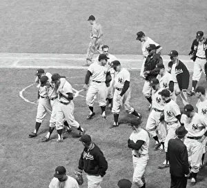 Mantle Helped Off Field After Injury