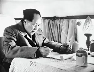 Mao Tse-Tung Working On Airplane