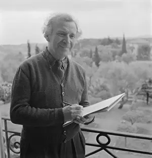 Marc Chagall with Drawing Pad in Hand