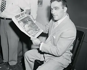 Marcel Cerdan with Newspaper