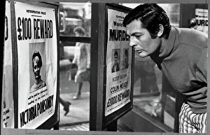 Marcello Mastroianni Looks at Poster