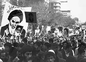 Marchers Carrying Ayatollah Khomeini Posters Protesting Shahpour Bakhtiar