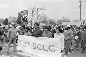 Marchers Passing Confederate Flag Wavers