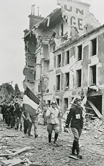 Marching Through Ruined Village