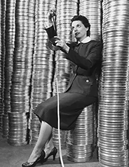 Editor Prints: Marcia Drennen Posed W/Film Reel Stacks