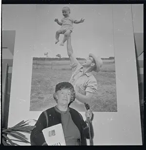 Margaret Mead in Front of Large Photograph