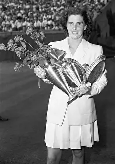 United Service Organizations Prints: Margaret Osborne Dupont Holding Trophy