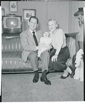 Margaret Whiting and Lou Bush Holding Their Baby Girl