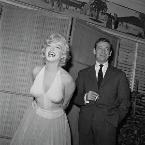 Marilyn at Cocktail Party with Yves Montand