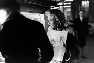 Marilyn Gets The Paper