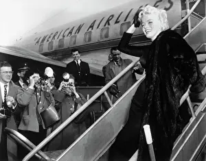 Steps Prints: Marilyn Monroe Boards Airplane