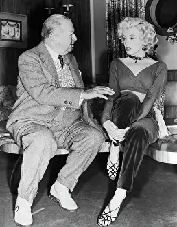 Marilyn Monroe and Charles Coburn Sitting and Talking