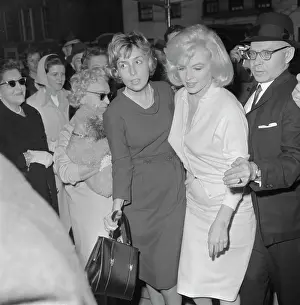 Marilyn Monroe Being Escorted from Hospital