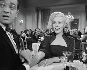 Marilyn Monroe and Friend Attending a Dinner Function