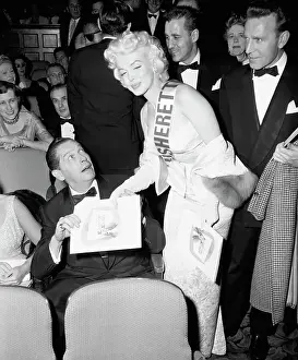 Marilyn Monroe Gives Milton Berle a Program