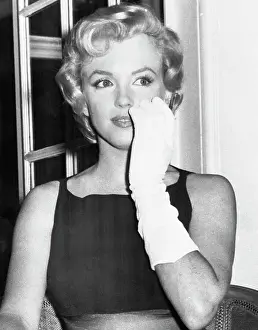 Marilyn Monroe Holding Gloved Hand to Face