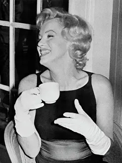 Marilyn Monroe Holding Tea Cup