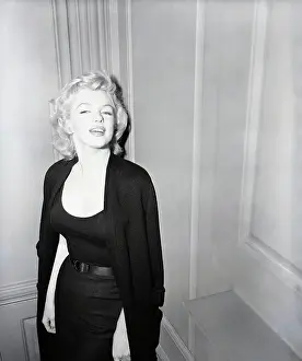 Marilyn Monroe Leaning Against Door