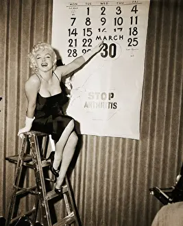 Calendar Prints: Marilyn Monroe Pointing to Large Calendar