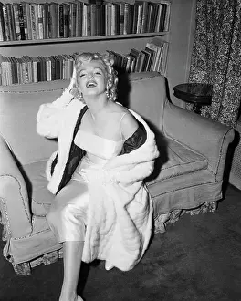 Bookshelf Prints: Marilyn Monroe Posing on Couch