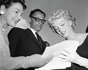Autographing Prints: Marilyn Monroe Signing an Autograph