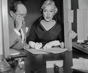 Marilyn Monroe Signing Papers