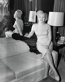 Marilyn Monroe Sitting on Arm of Sofa