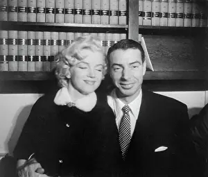 Marilyn Monroe Sitting with Joe DiMaggio