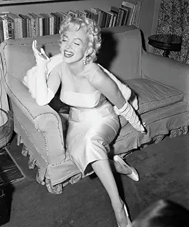 Marilyn Monroe Smiling on Couch