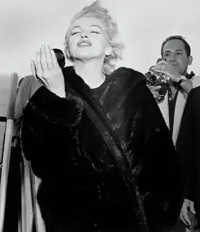 Marilyn Monroe Throws A Kiss At Airport