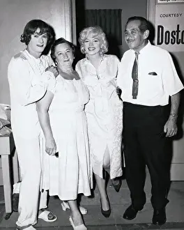 Marilyn Monroe with Tony Curtis and Others