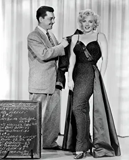 Marilyn Monroe and Travilla Standing Together