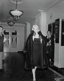 Marilyn Monroe Walking Down Hallway