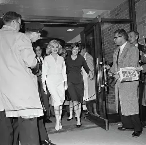 Marilyn Monroe Walking Through Hospital Doors