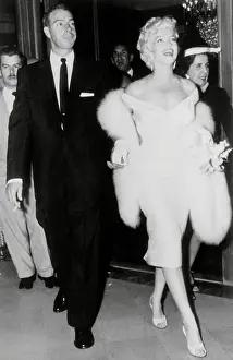 Marilyn Monroe Walking with Husband Joe DiMaggio