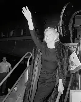 Marilyn Monroe Walking Leaving Airplane and Waving