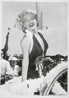 Prints of (Original Caption). The Miss America Beauty Pageant is having more than its customary glitter this year Marilyn Monroe: A Fashion Legacy: Marilyn Monroe Waving as Grand Marshal of Miss America Pageant