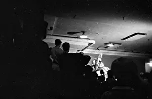 Prints of NEW YORK - MARCH 1955: Movie star Marilyn Monroe rides a pink elephant in Madison Square Garden for a circus charity event as she is surrounded by photographers in March 1955 in New York City Marilyn Monroe: The Iconic Muse Prints: Marilyn Rides A Pink Elephant