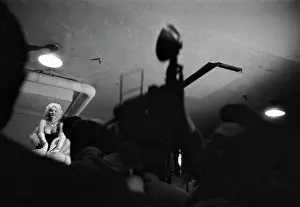 Prints of NEW YORK - MARCH 1955: Movie star Marilyn Monroe rides a pink elephant in Madison Square Garden for a circus charity event as she is surrounded by photographers in March 1955 in New York City Marilyn Monroe: The Iconic Muse Prints: Marilyn Rides A Pink Elephant
