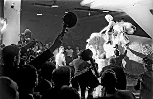 Prints of NEW YORK - MARCH 1955: Movie star Marilyn Monroe rides a pink elephant in Madison Square Garden for a circus charity event as she is surrounded by photographers in March 1955 in New York City Marilyn Monroe: The Iconic Muse Prints: Marilyn Rides A Pink Elephant