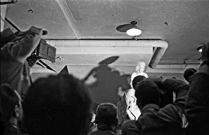 Prints of NEW YORK - MARCH 1955: Movie star Marilyn Monroe rides a pink elephant in Madison Square Garden for a circus charity event as she is surrounded by photographers in March 1955 in New York City Marilyn Monroe: The Iconic Muse Prints: Marilyn Riding A Pink Elephant