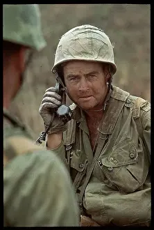Marine Talking on Field Radio Phone