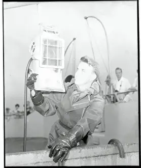 Enthusiasm Prints: Marineland Diver Posing with a Diving Tool