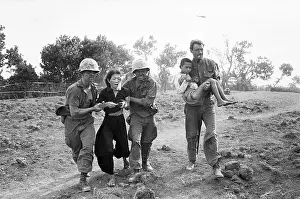 War Victim Prints: Marines Help Wounded Vietnamese