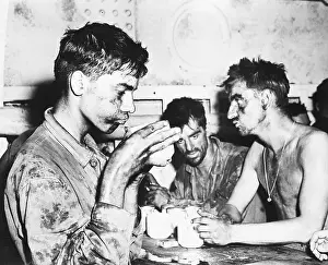 Exhausted Prints: Marines Resting After Marshall Islands Battle